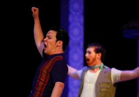 Photo courtesy of Saed Hindash. Marcus Shin, playing Sam Carmichael, sings a powerful solo number.