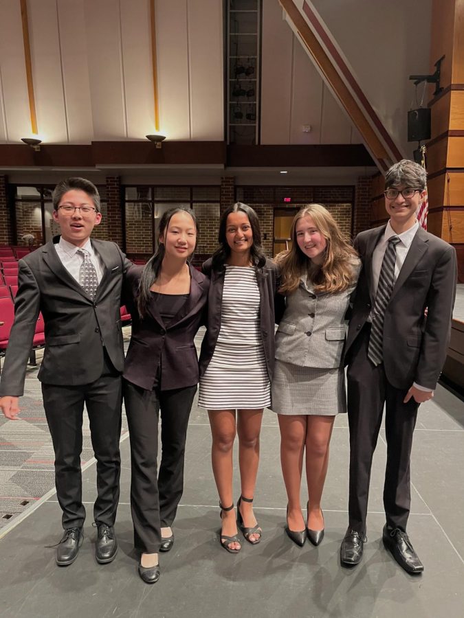 After+completing+their+first+debate%2C+senior+Reva+Gandhis+squad+is+pictured+smiling+for+a+group+photo.+From+left+to+right%3A+Ryan+Wu+%2810%29%2C+Grace+Zhang+%289%29%2C+Reva+Gandhi+%2812%29%2C+Elsa+Hoderewski+%2810%29%2C+and+Samith+Rohatgi+%2810%29