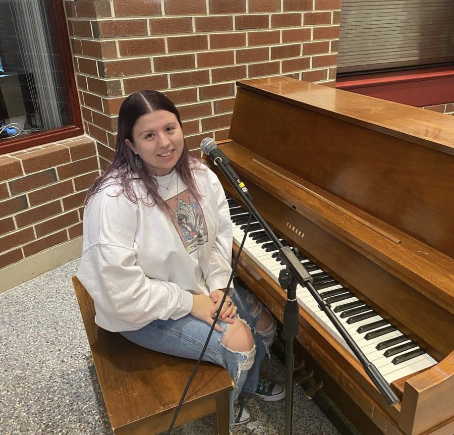 Natalie Schwartz (11) performing and playing the piano