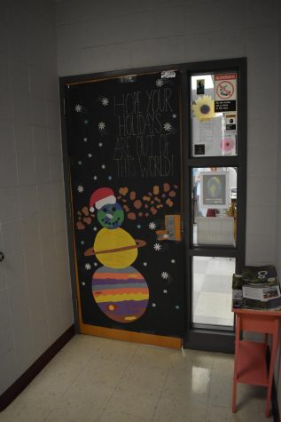 To celebrate their last holiday season in Parklands halls, four seniors, Angelina Hallal, Naeema Salau, Habebah Nawar, and Devanshi Patel, put together a holiday door that is out of this world.