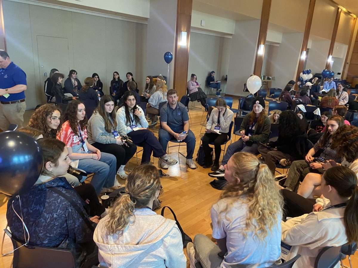 Parkland students meet with Penn State communications students with a round table.