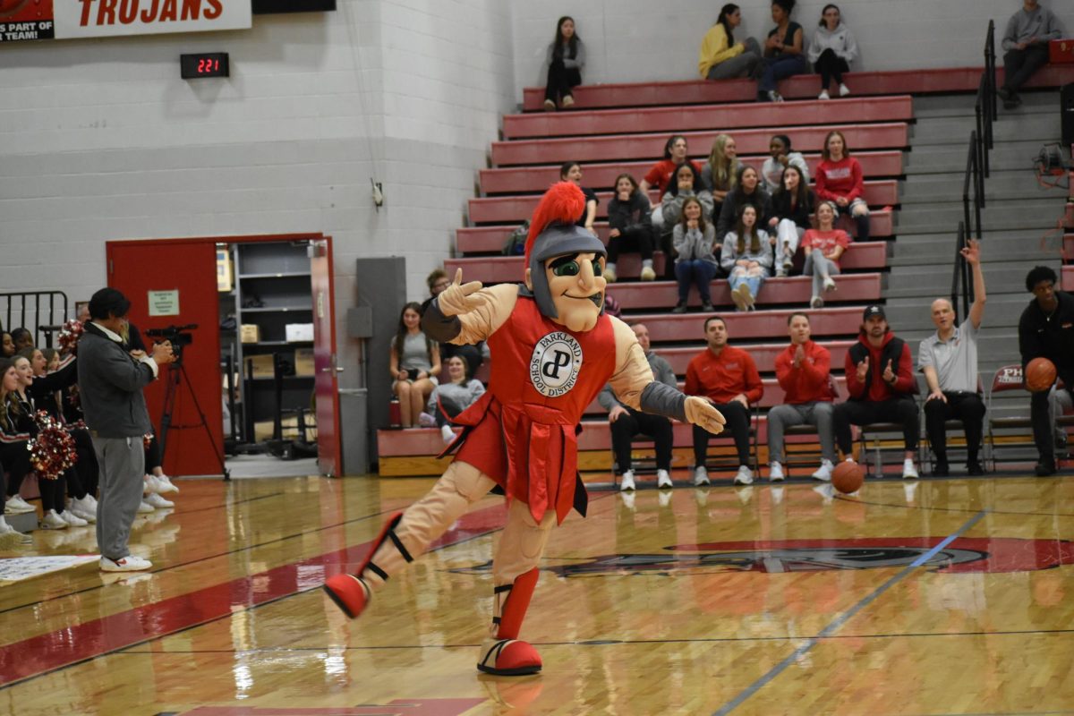 Our Mascot, The Trojan, celebrating at the Pep Rally for the Boys Basketball team. 