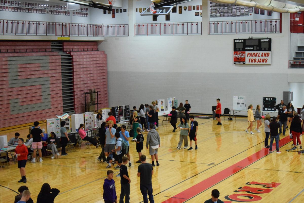 Stand set up in the gym at the Student Involvement Fair