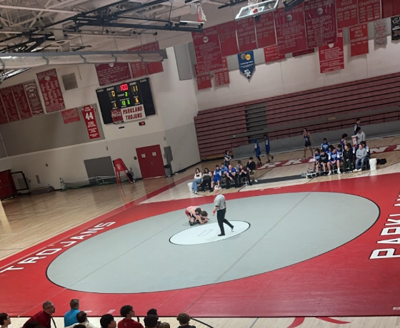 The environment at the wrestling dual is electric. 