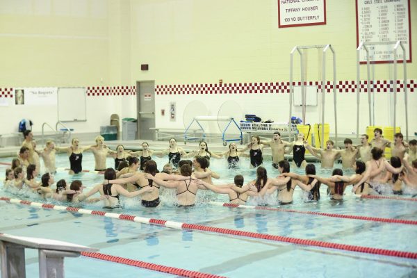 The PHS swim and dive team celebrating after a regular meet.