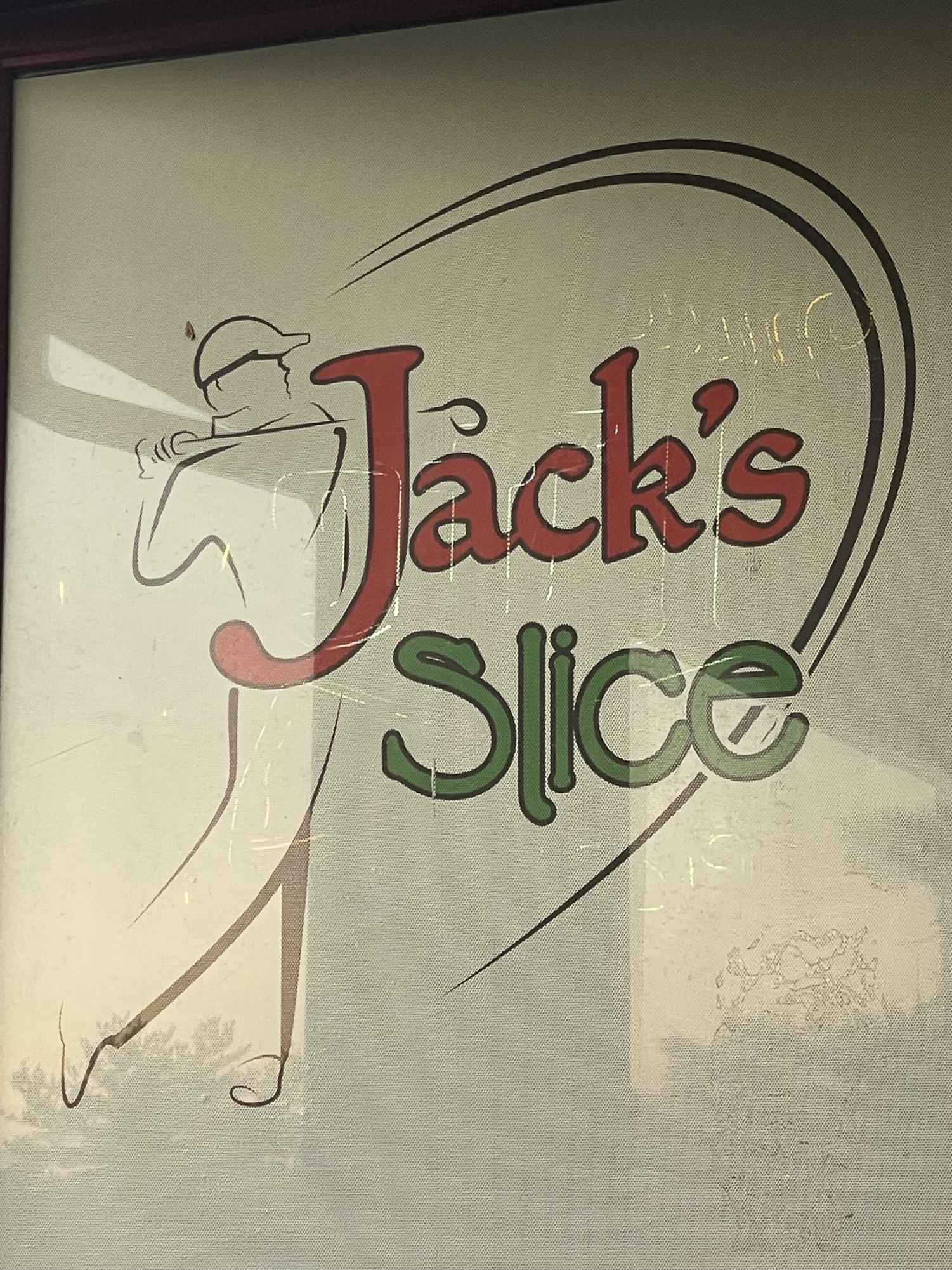 The sign of the restaurant depicts its proximity to the golf course.