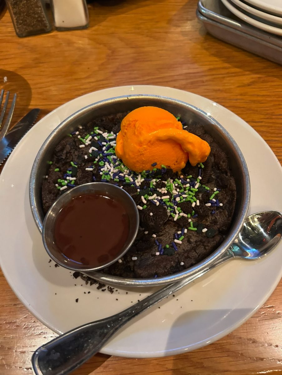 The famous Spooky Pizookie, bright orange ice cream and all