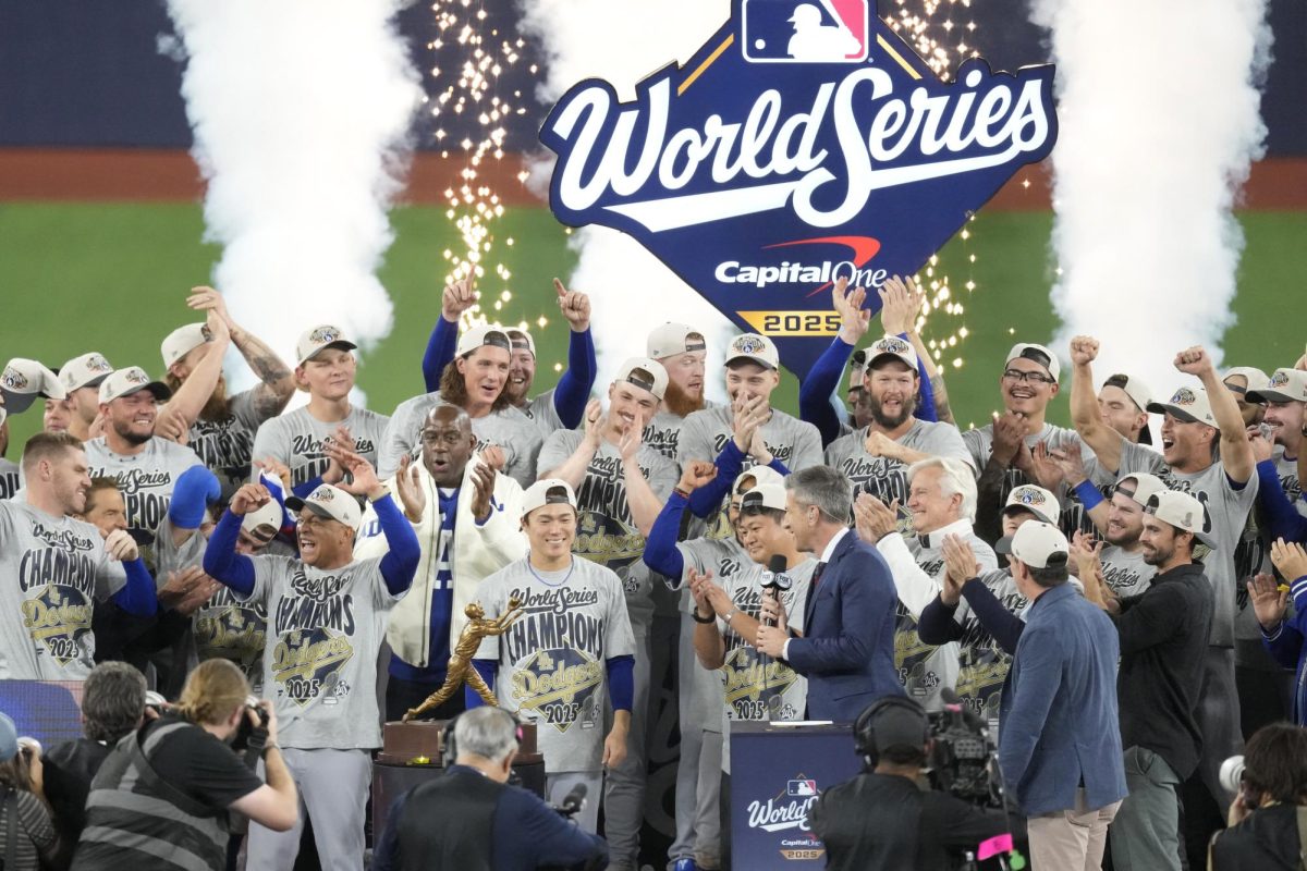 Nov 1, 2025; Toronto, Ontario, CAN; The Los Angeles Dodgers celebrate on the podium after defeating the Toronto Blue Jays in game seven of the 2025 MLB World Series at Rogers Centre. Mandatory Credit: Kevin Sousa-Imagn Images/ FIle Photo
